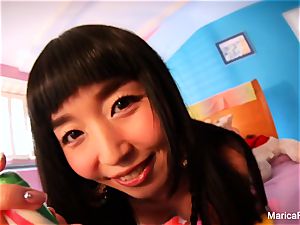 japanese starlet Marica Hase plays with candy salami
